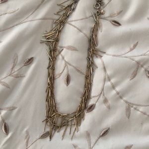 Metal tassel necklace